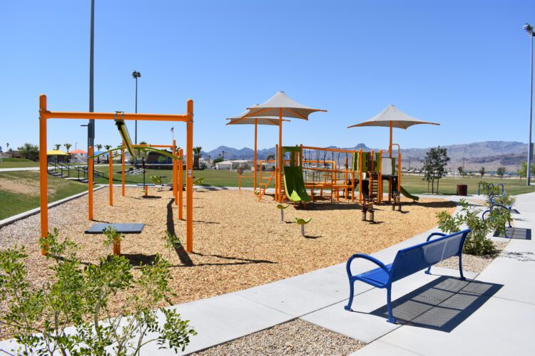 Cypress Park playground and blue bench