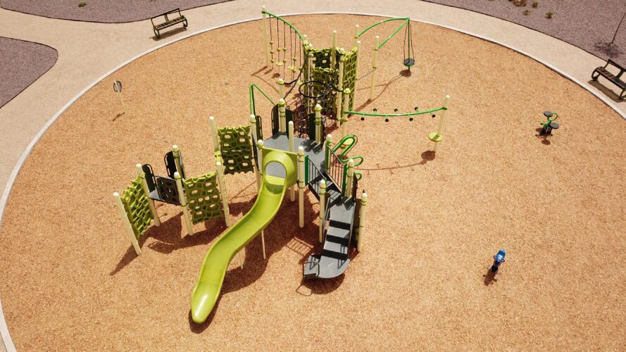 playground with climbing pieces, slides, and walkways