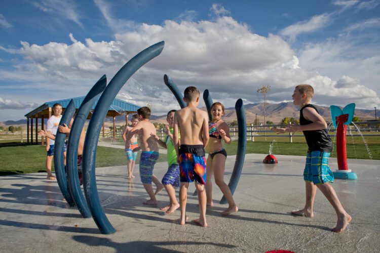 kids playing on splash pad