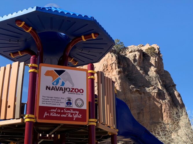 Navajo Zoo sign attached to playground