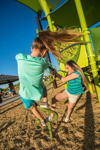 girls playing at the park