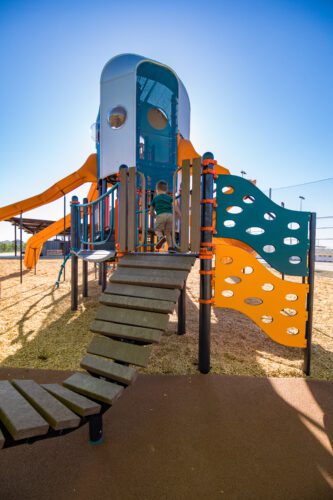 kids climbing on the playground at Eastmark Great park