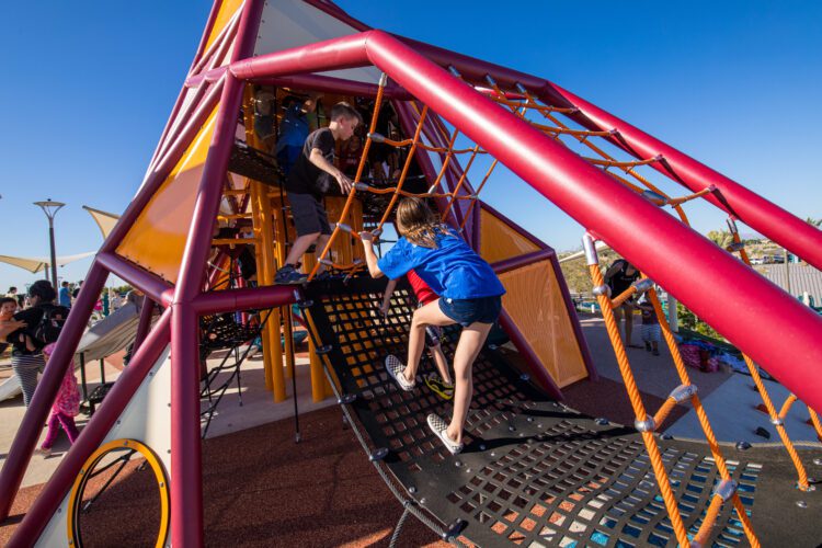 kids climbing up nets