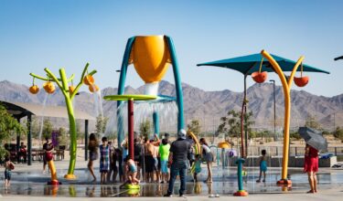 large group of kids at the splash pad