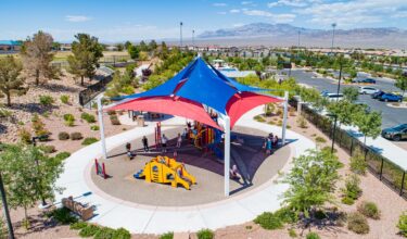 large sun shade over playground at Alyn Beck Park