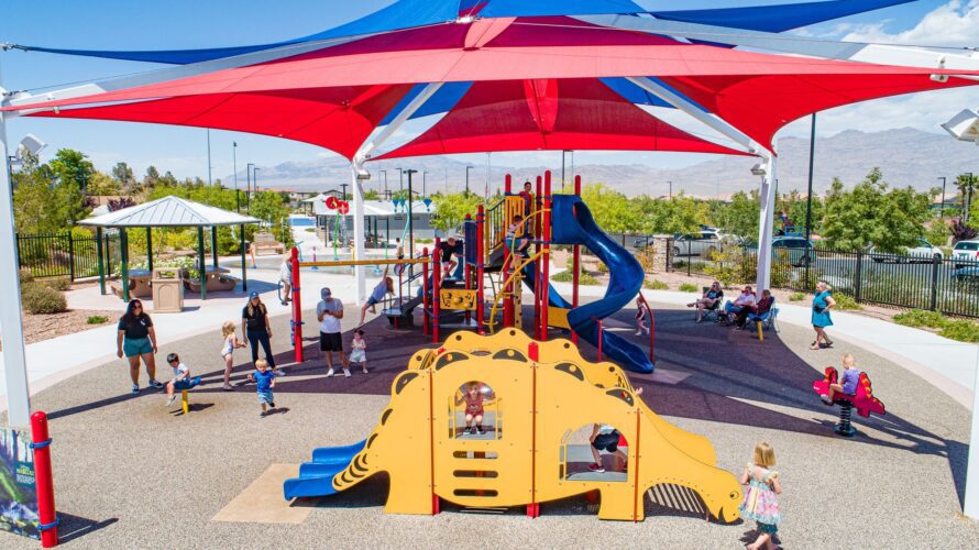 kids playing under shade structures at Alyn Beck Memorial Park