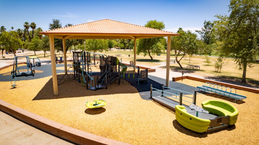 playground equipment underneath shade structure