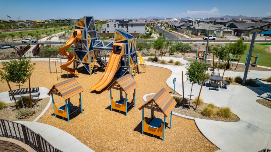 small shade areas and playground equipment at Inspirian park