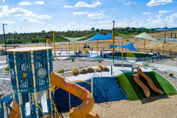 park with splash pad in background