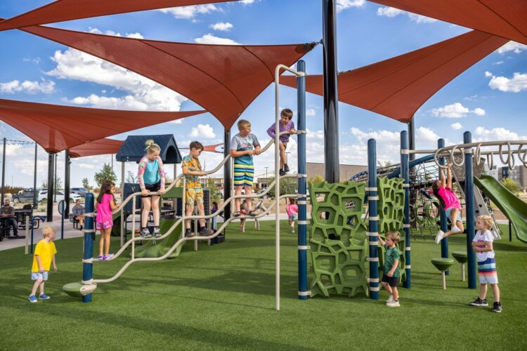 kids climbing up playground