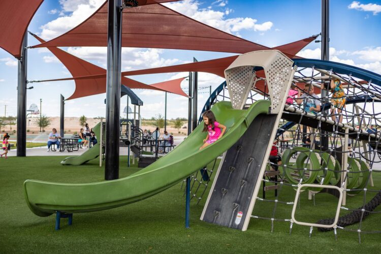 girl going down slide