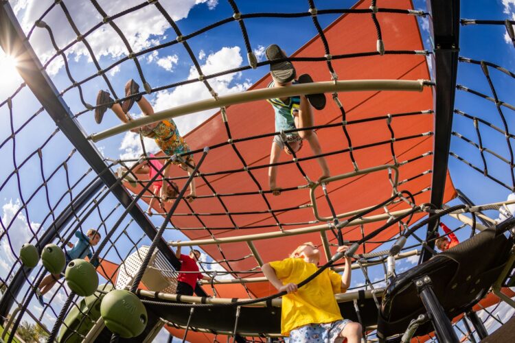 kids climbing on nets